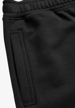 Bekväm sweatshirtbyxa med bakfickor