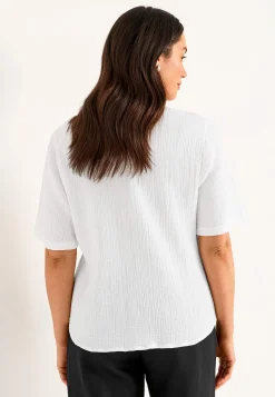 Blus i krinklad bomull