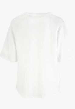 Blus i krinklad bomull