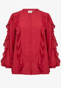 Blus med volanger