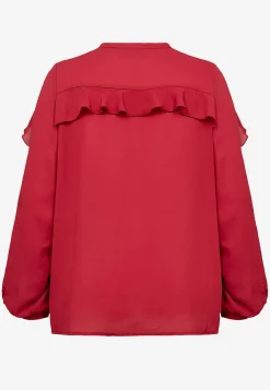 Blus med volanger