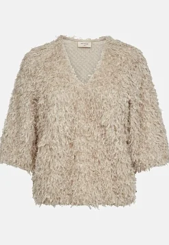 Festtopp med fjäderliknande material