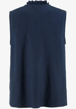 Ärmlös blus med rynkdetaljer